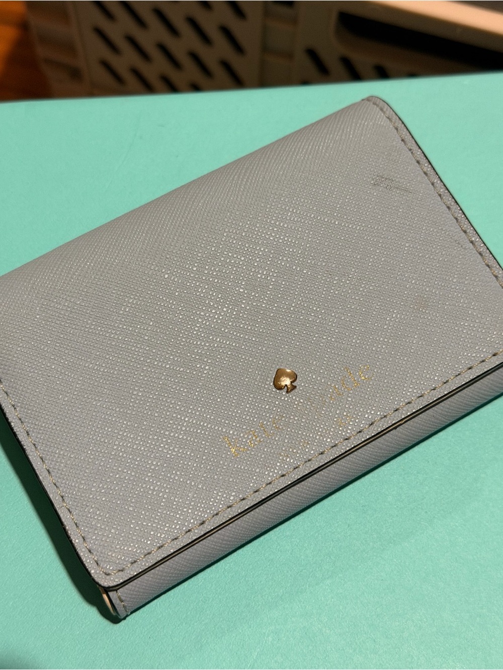 kate spade gray compact bifold wallet with gold logo